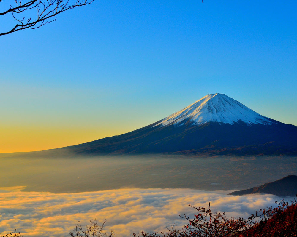 Mount Fuji above the clouds at sunrise